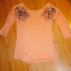 Women's coral top from buckle